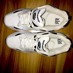 Predominately white but has silver and navy blue accents